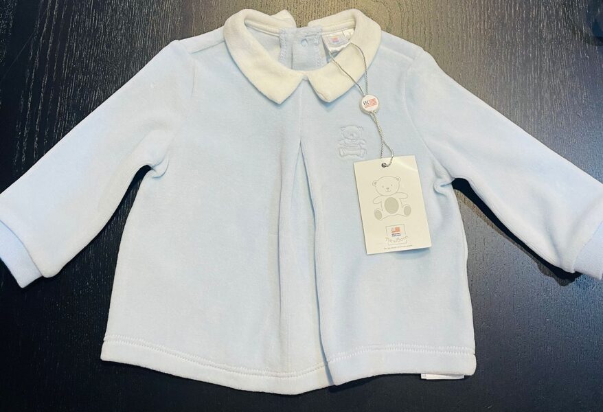 # gaiši zila jaciņa aizpogājama aizmugurē ar lāci 56 cm