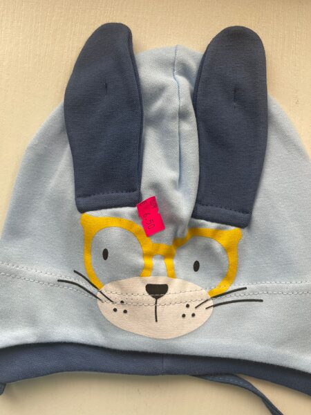 Puišu cepure/plāna/sasienama/gaiši zila ar tumši zilām ausīm/brilles+deguns/platums 20 cm/dziļums 16 cm